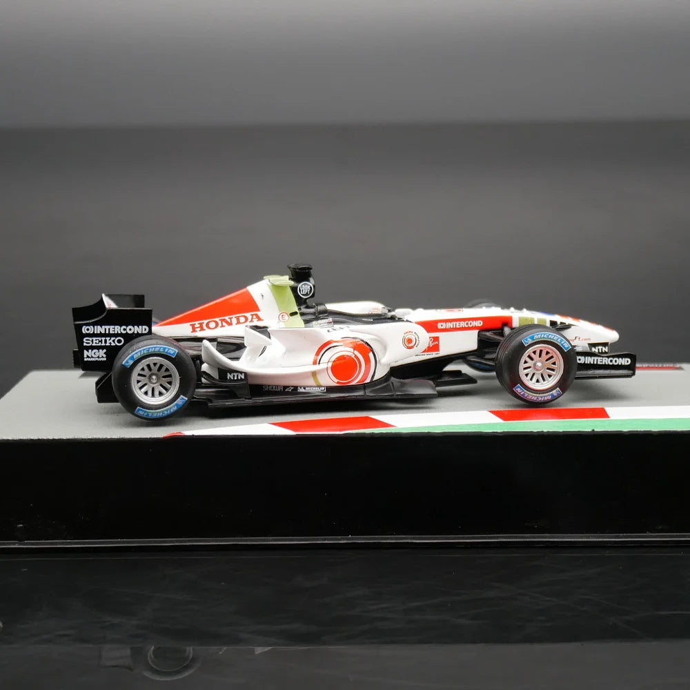 Miniatura Honda RA106 1:43 Jenson Button 2006